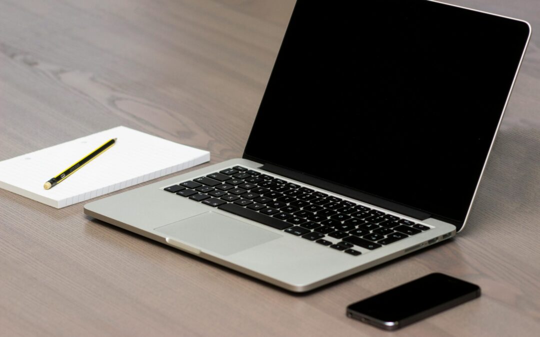 Free Silver Macbook Beside Iphone Stock Photo